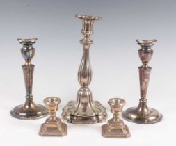 A pair of 20th century Danish sterling silver candlesticks, each with urn shaped sconce and