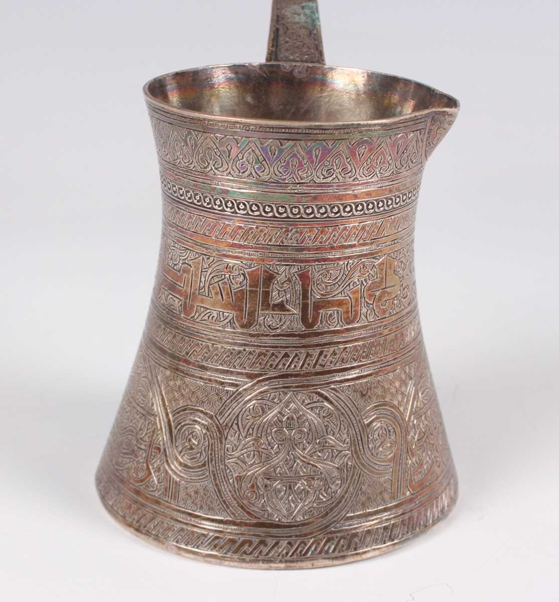 An Egyptian silver coffee pot of waisted cylindrical form with pouring lip and flat handle, all - Image 3 of 6