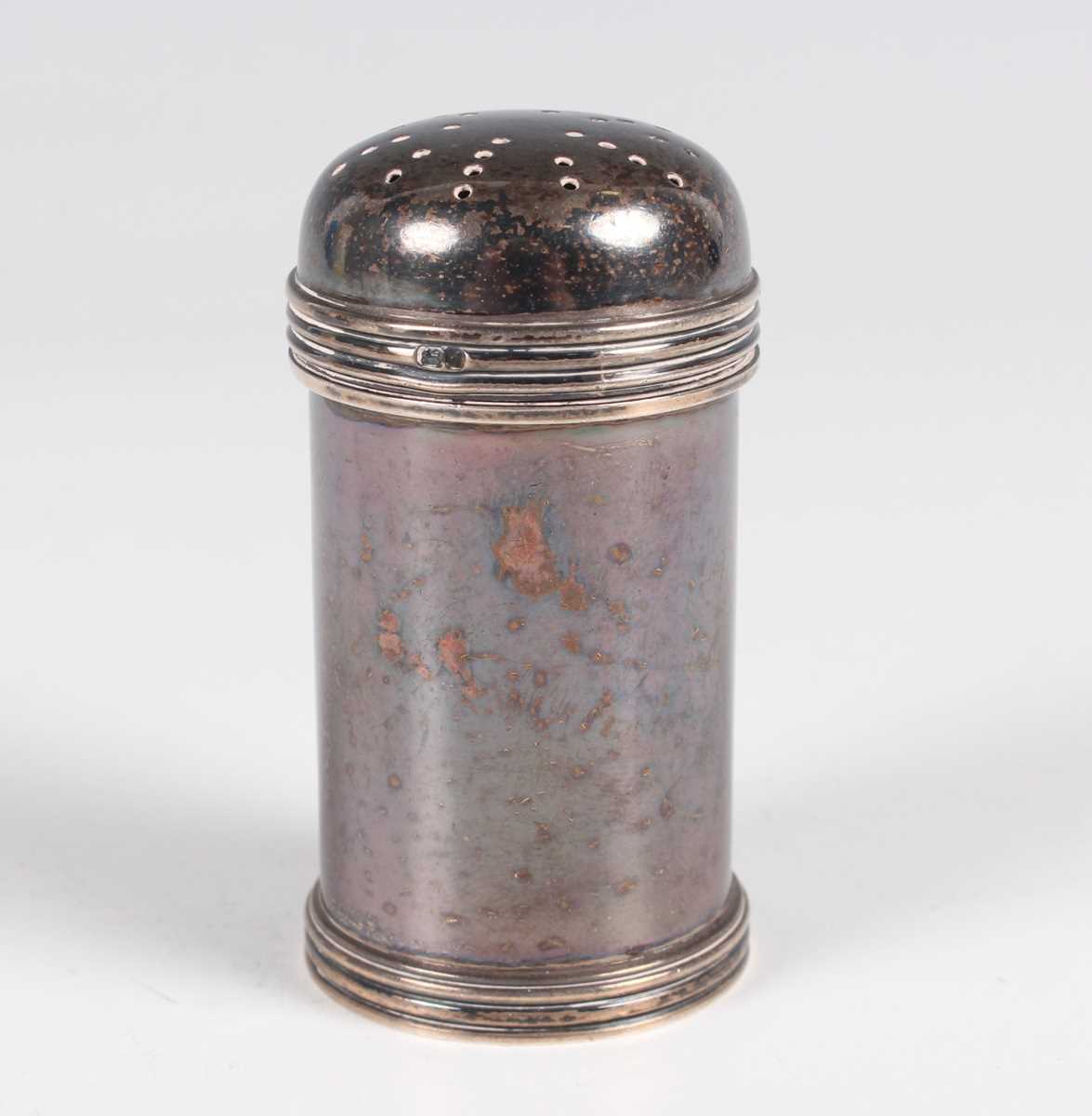 An Elizabeth II silver cylindrical pepper caster with pierced domed top and reeded bands, Birmingham