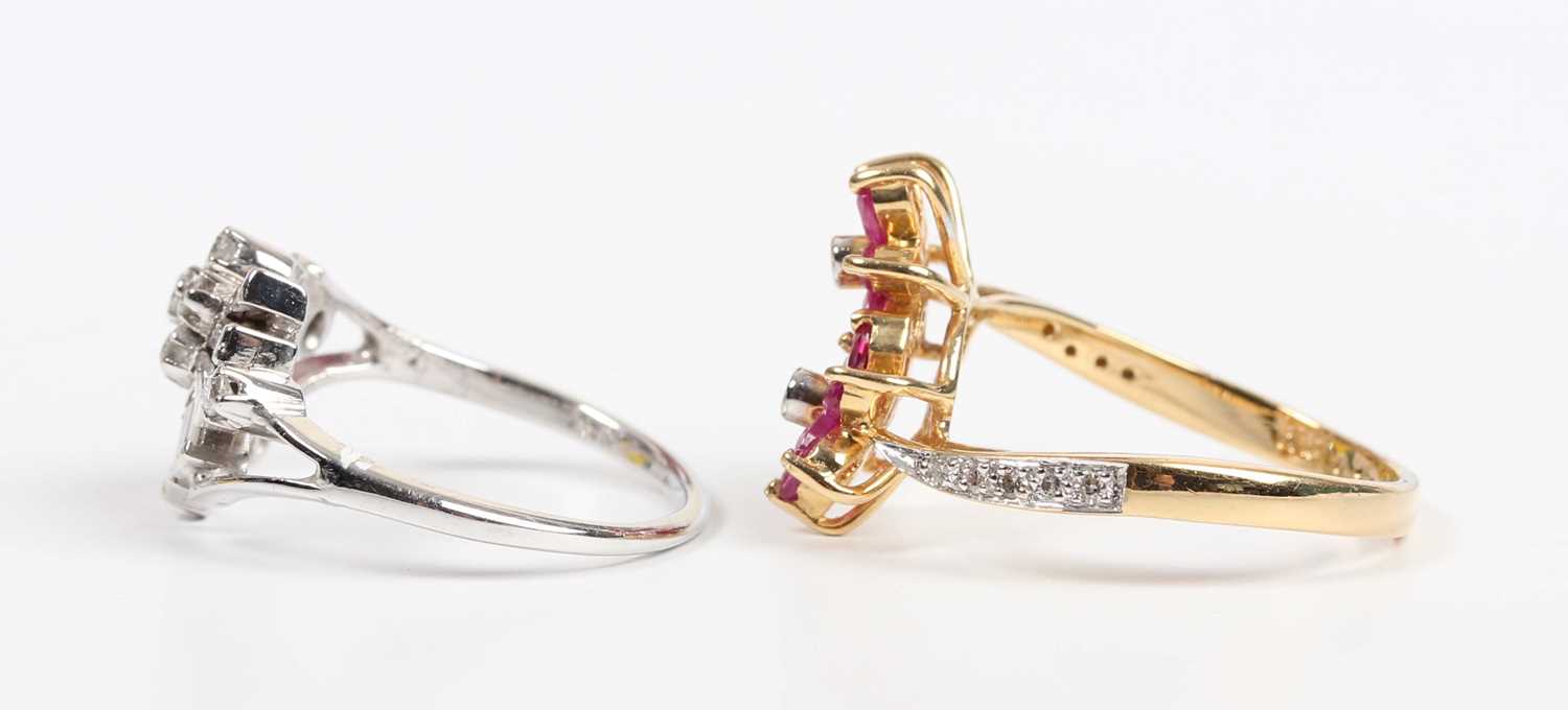 A gold, treated pink sapphire and diamond ring in a twin flowerhead shaped twist design, detailed ‘ - Image 3 of 4