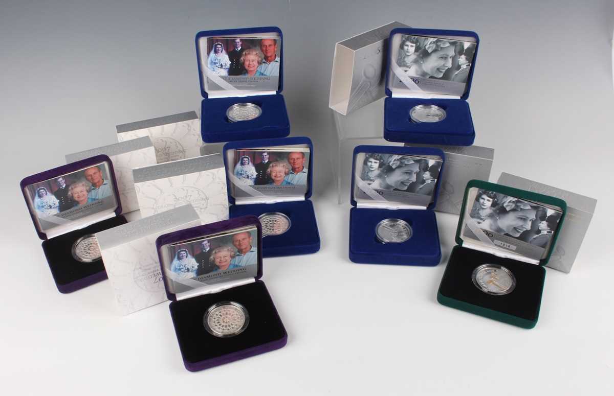 A group of seven Elizabeth II Royal Mint piedfort and other silver proof crown-size commemorative