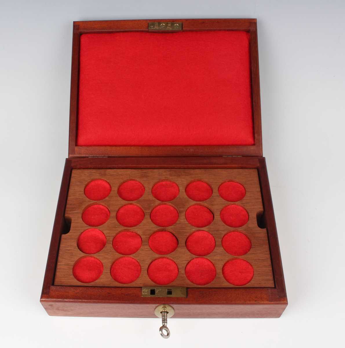 A 20th century mahogany coin collector's box, the four fitted trays with various diameter coin - Image 2 of 3