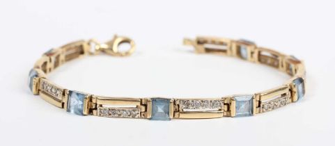 A gold, synthetic blue spinel and colourless gem set bracelet, mounted with square cut synthetic