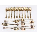 Three 19th century French silver gilt dessert spoons, weight 167.3g, length 18.7cm, together with