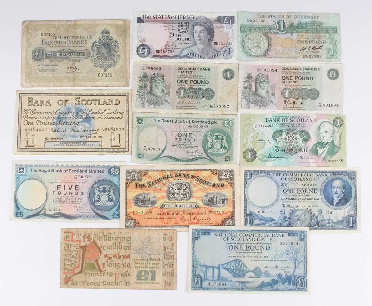 A large collection of European and world banknotes, mostly circulated and soiled, including a