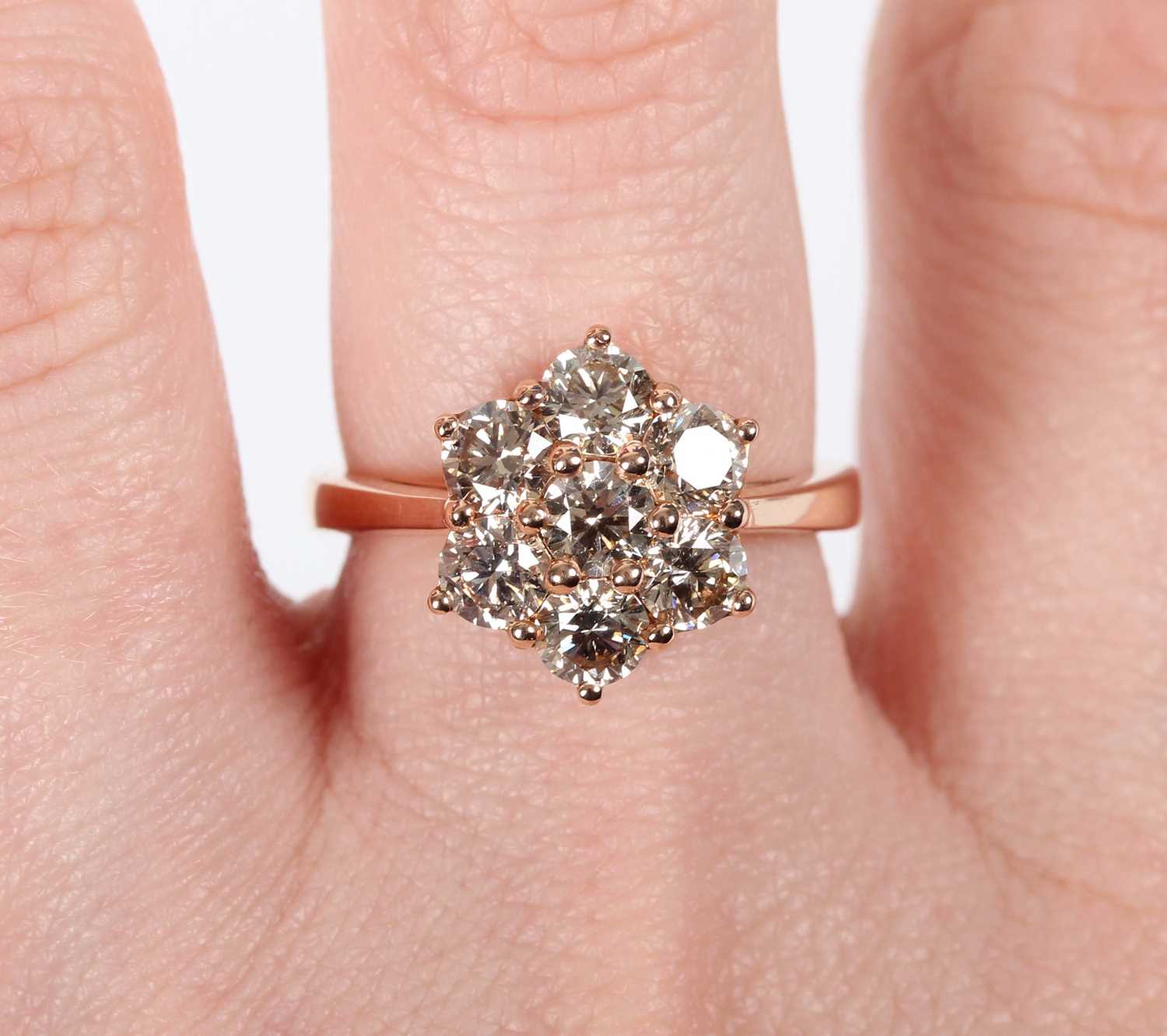 A rose gold and diamond cluster ring, mounted with seven circular cut diamonds, weight 5.8g, total - Image 5 of 6