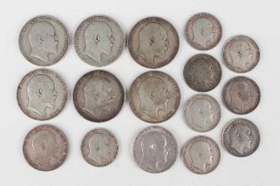 A collection of Edward VII silver coinage, including a shilling 1905, a group of half-crowns,