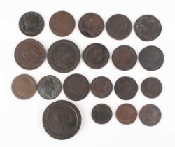 A George III cartwheel twopence 1797 and a group of 17th and 18th century copper coinage.