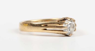 A gold ring, claw set with a circular cut diamond, detailed ‘18ct’, weight 3.8g, diamond weight