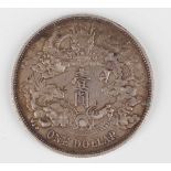 A China Xuantong era yuan Dragon dollar, year 3, 1911, reverse with dragon winding left with value