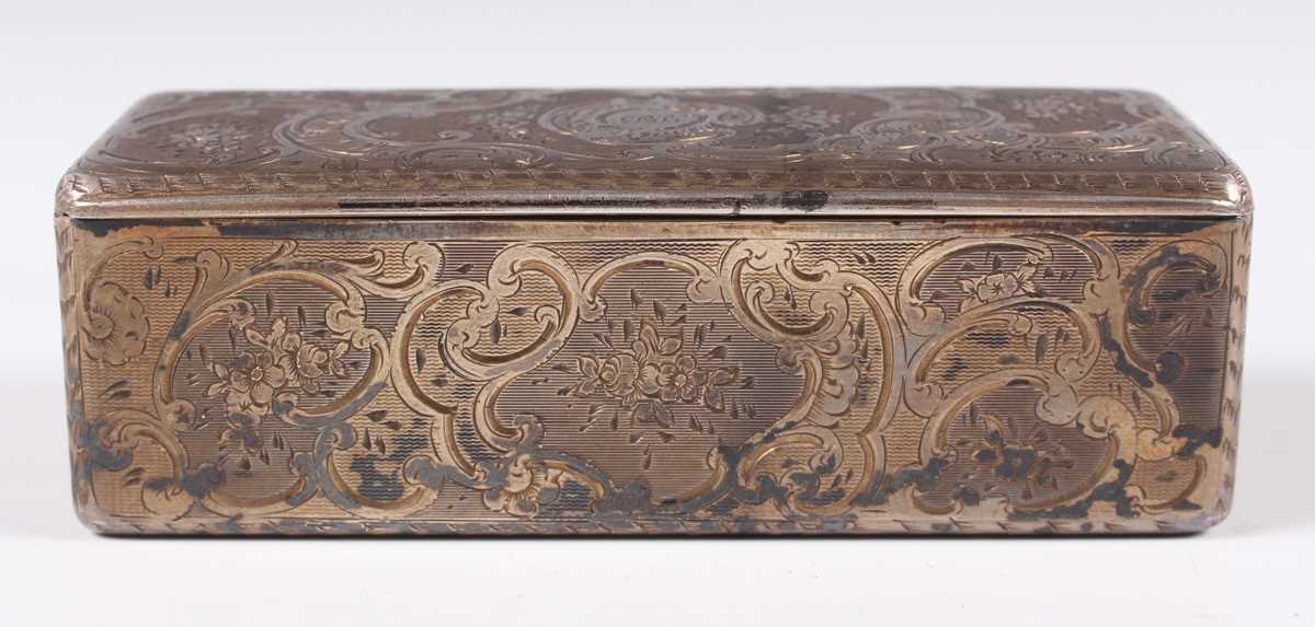 A 19th century French silver and parcel gilt rectangular snuff box, engraved with flowers and - Image 4 of 10