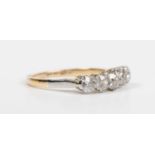 A gold, platinum and diamond five stone ring, mounted with a row of old cut diamonds, detailed ‘18ct