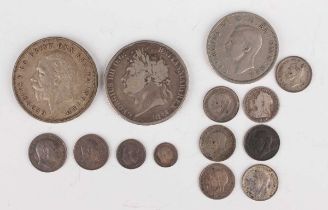 An Edward VII Maundy four-coin set 1907, uncased, a George III crown 1822, a George V crown 1935 and