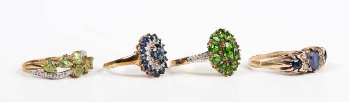 A 9ct gold, chrome diopside and diamond oval cluster ring, claw set with the principal oval cut