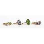 A 9ct gold, chrome diopside and diamond oval cluster ring, claw set with the principal oval cut