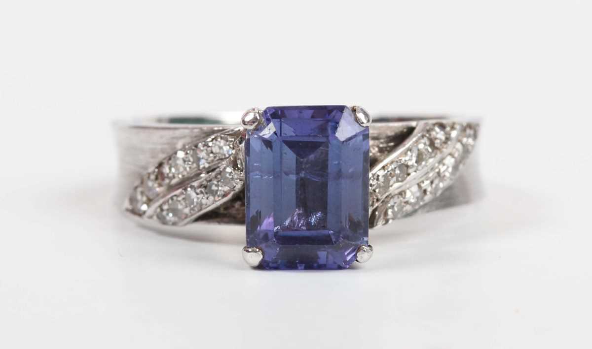 A white gold, tanzanite and diamond ring, claw set with the cut cornered rectangular tanzanite - Image 7 of 10