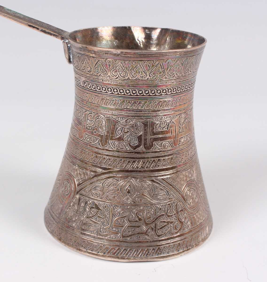 An Egyptian silver coffee pot of waisted cylindrical form with pouring lip and flat handle, all - Image 4 of 6
