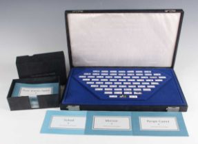 A Franklin Mint 'Gemstones of the World' set of sixty-three silver rectangular ingots, each ingot