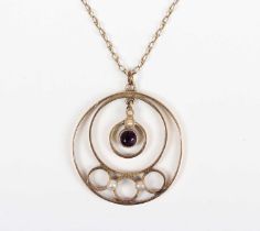 A gold, amethyst and seed pearl pendant in an openwork design, unmarked, weight 2.3g, length 3cm,