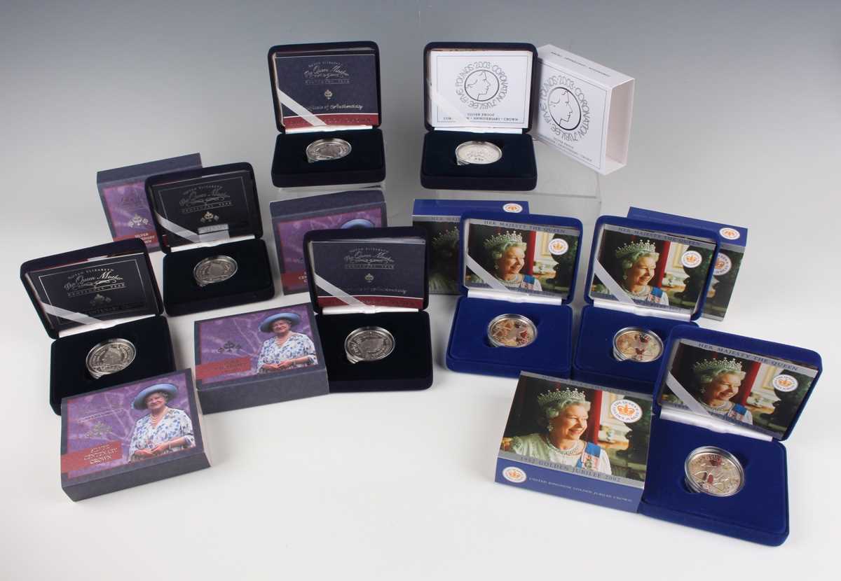 A group of eight Elizabeth II Royal Mint silver proof crown-size commemorative coins, including four