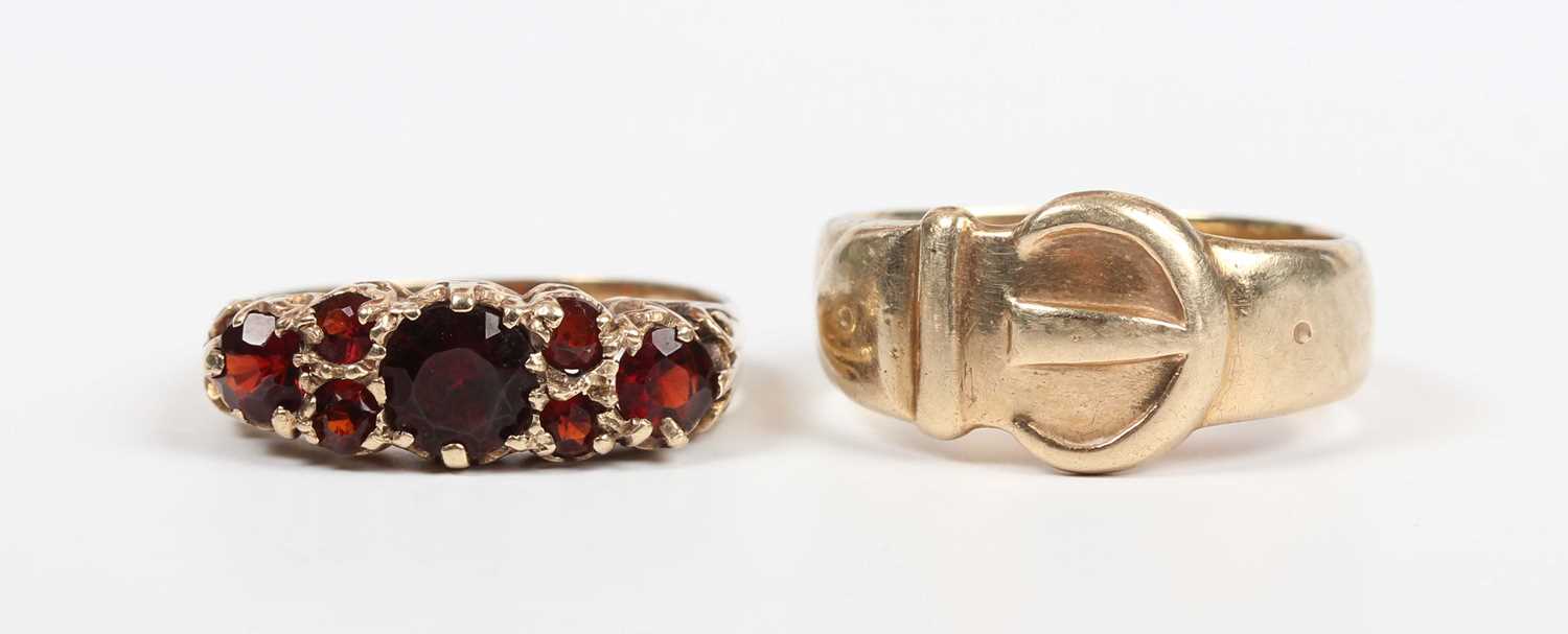 A 9ct gold ring in a buckle and strap design, Birmingham 1979, ring size approx N1/2, and a 9ct gold - Image 2 of 4