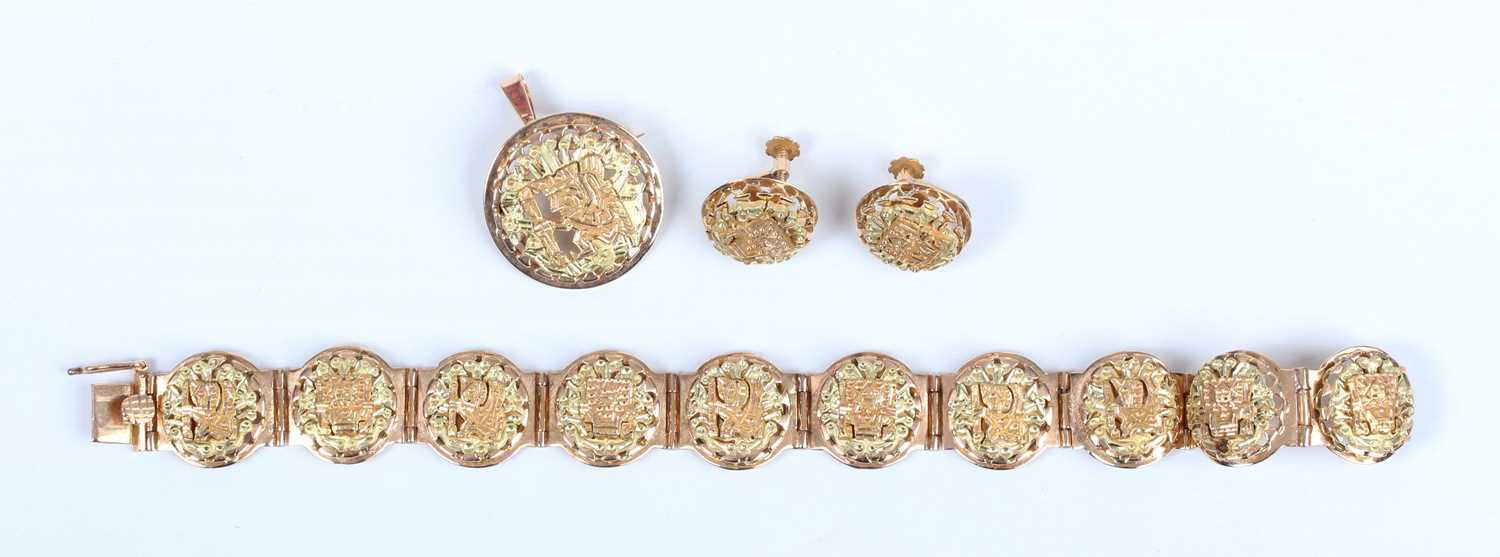 A two colour gold suite of South American jewellery, comprising a circular panel link bracelet on