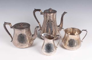 A Victorian silver four-piece tea set of tapering cylindrical form, engraved with opposing 'C'