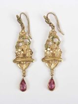 A pair of late Victorian gold pendant earrings, each in a floral design with a pear shaped pink