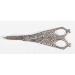 A pair of late Victorian silver grape shears, the tapering handles pierced and engraved with