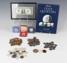 A small collection of USA coinage and one banknote, including a Warman's 'State Quarters 1999-