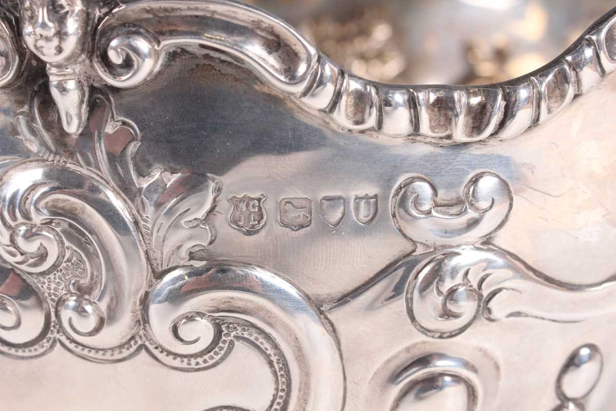 A late Victorian silver monteith style rose bowl, the front embossed with a vacant 'C' scroll - Image 2 of 2