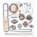 A small group of jewellery, including a gold and amethyst single stone brooch, mounted with an