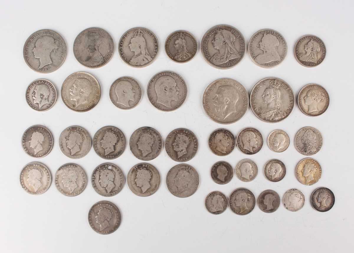 A collection of Victorian and later silver coinage, including a Victoria Young Head shilling 1883, a