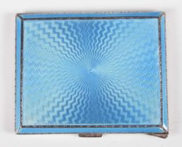 A George V silver and blue enamelled rectangular cigarette case with engine turned decoration,