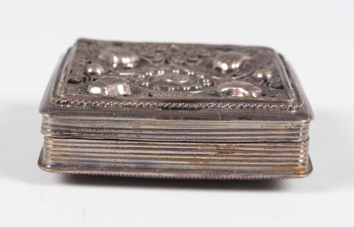 A 19th century French silver and parcel gilt rectangular snuff box, engraved with flowers and - Image 8 of 10