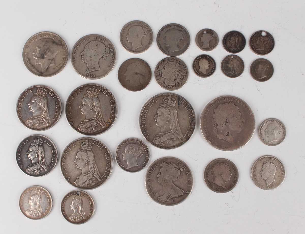 A collection of 18th, 19th and early 20th century British silver coinage, including an Anne half-