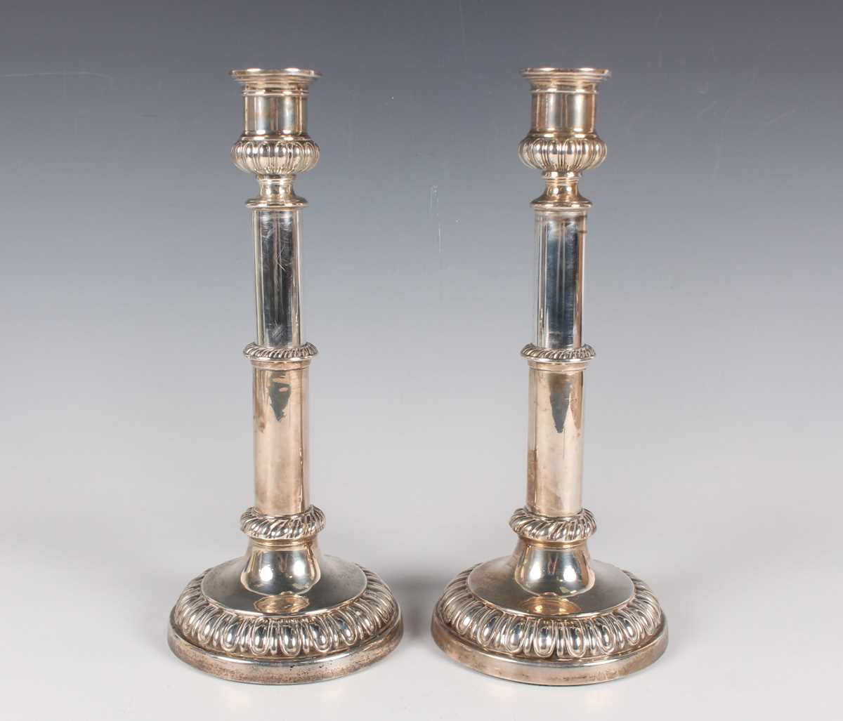 A pair of George IV silver telescopic candlesticks, each with half-reeded urn shaped sconce above - Image 2 of 3