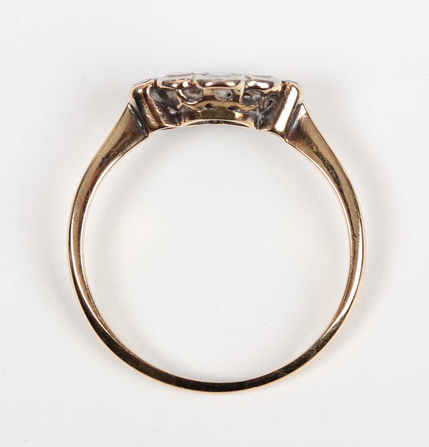 A gold, platinum and diamond nine stone cluster ring in a lozenge shaped design, mounted with - Image 4 of 5
