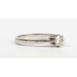 A platinum and diamond single stone ring, claw set with a circular cut diamond, detailed ‘.33ct’