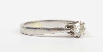 A platinum and diamond single stone ring, claw set with a circular cut diamond, detailed ‘.33ct’