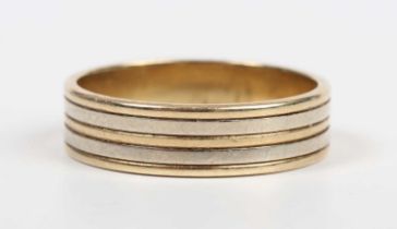An 18ct two colour gold wedding band ring, weight 7.2g, ring size approx W.