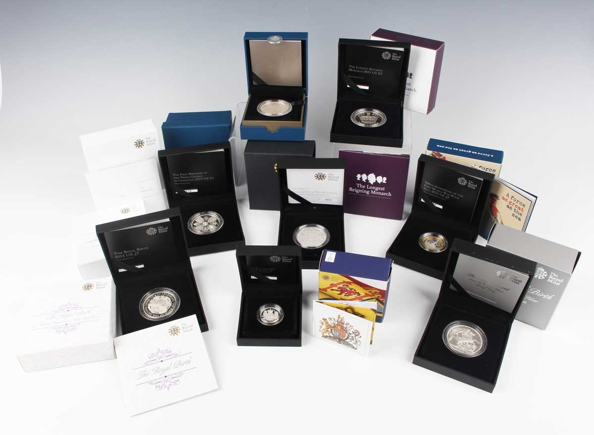 A group of nine Elizabeth II Royal Mint silver proof commemorative coins, including two First