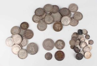 A collection of British silver coinage, including George III, Victoria and George V, comprising