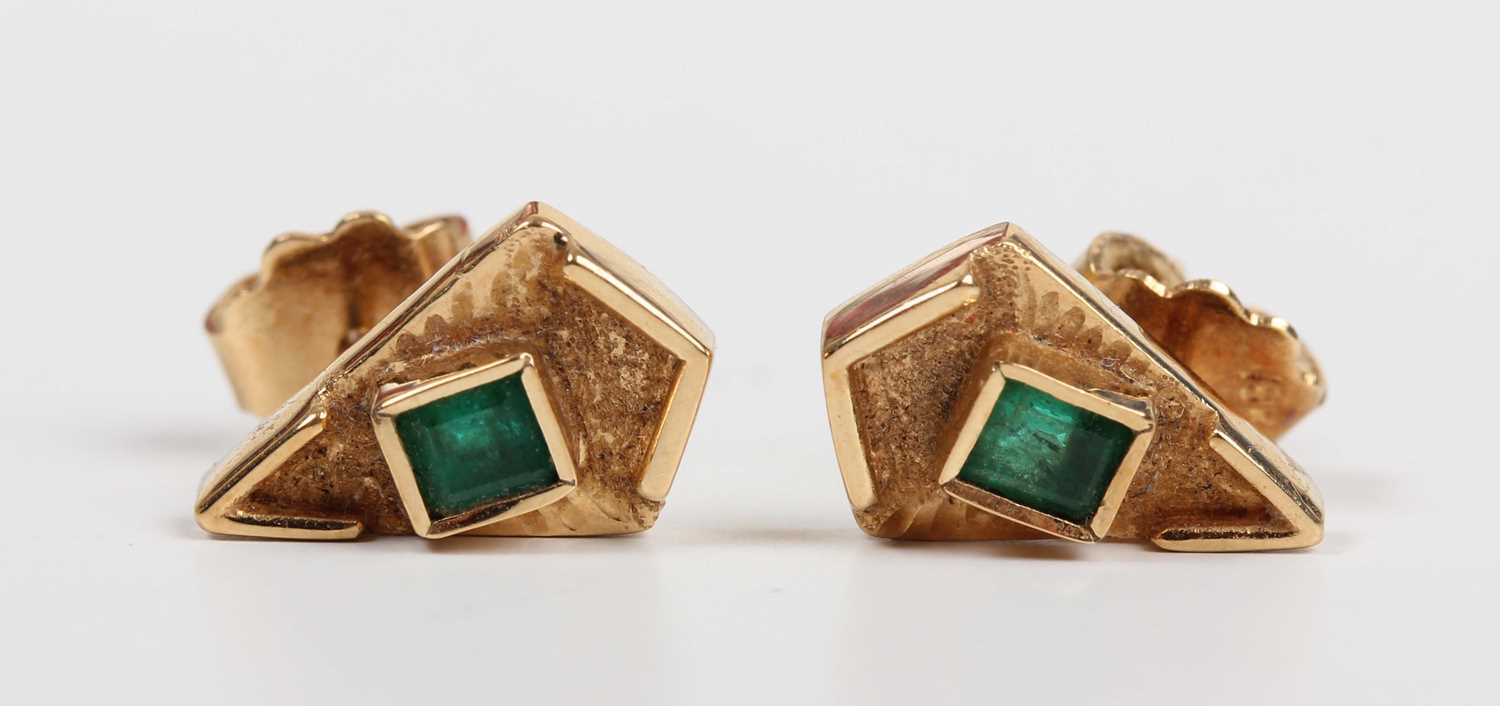 A gold pendant collet set with a cut cornered square step cut emerald to the centre, detailed ‘18K’, - Image 3 of 3