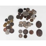 A large collection of British and world coins, tokens and medallions, including a George III crown