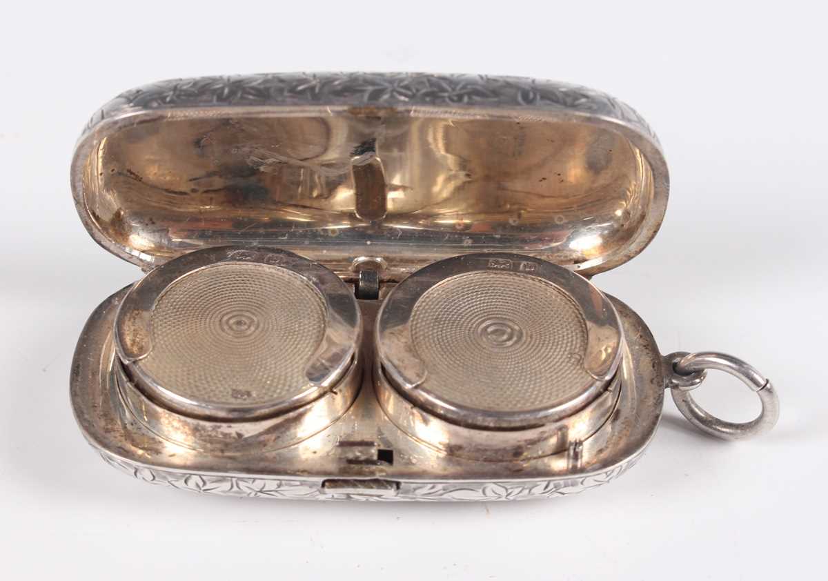 An Edwardian silver twin-sovereign case with foliate engraved decoration, fitted with a suspension - Image 3 of 4