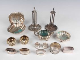 A small collection of Continental silver, including a pair of .800 shell shaped dishes, a .800 cream