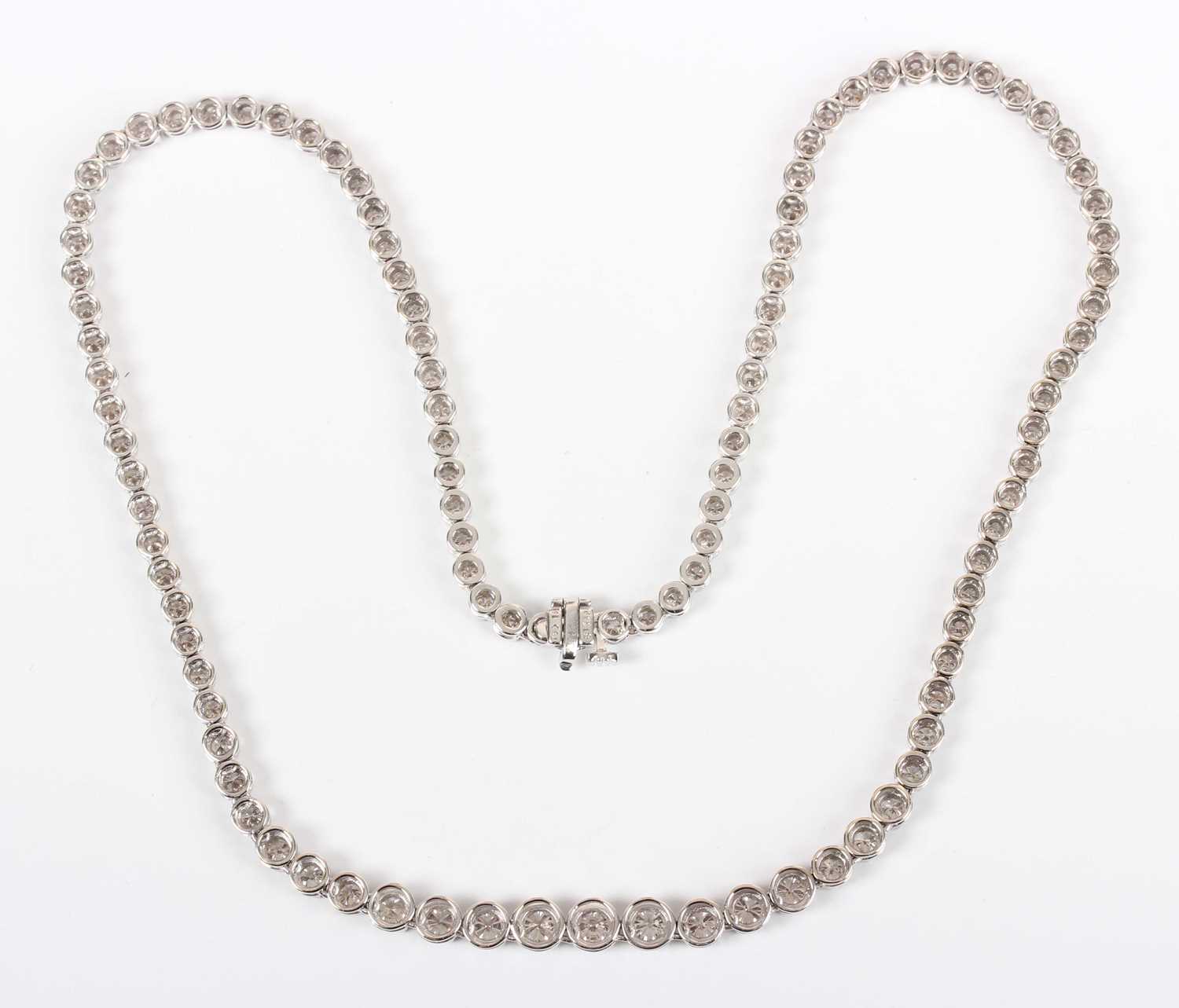 An 18ct white gold and diamond collar necklace, claw set with a row of graduated circular cut - Image 3 of 5