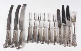 A set of six George V silver pistol handled two-pronged dinner forks, London 1928 by C.W. Fletcher &