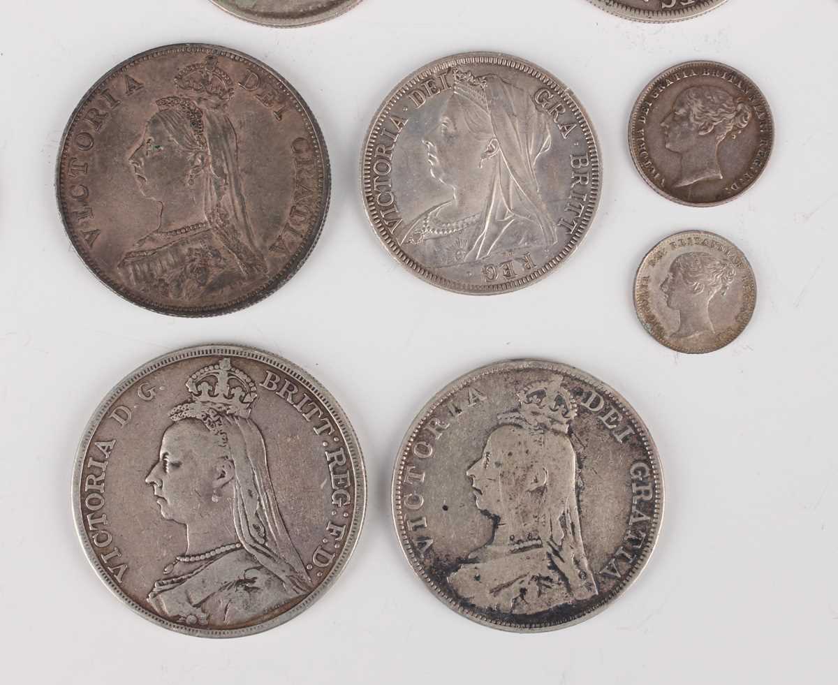 A group of eight Victoria Young Head half-crowns, including 1884 and 1885, and a group of other - Image 2 of 3